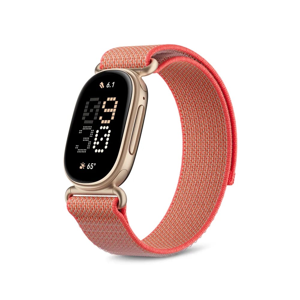 The Fitbit Edge in Canyon, a gold case showing the time and weather on a woven coral loop band